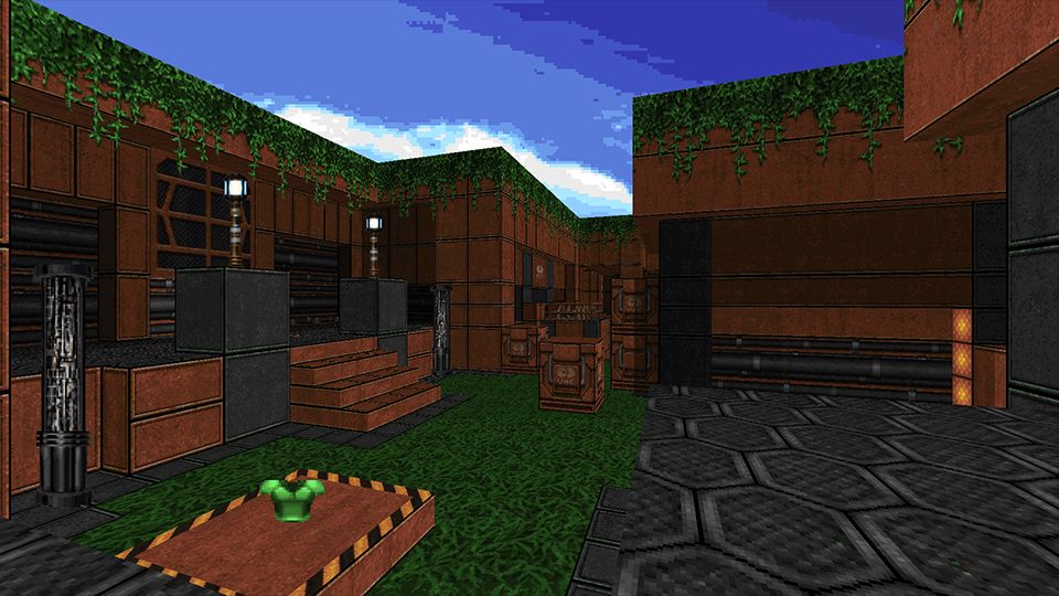 An open area shows an armor pickup, stairs and orange mechanical surfaces contrasted with bright green vegetation.