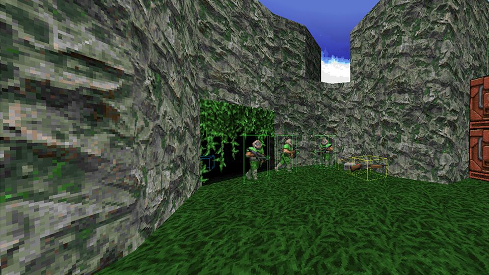 An outdoor level with jungle and rocky cliffs.