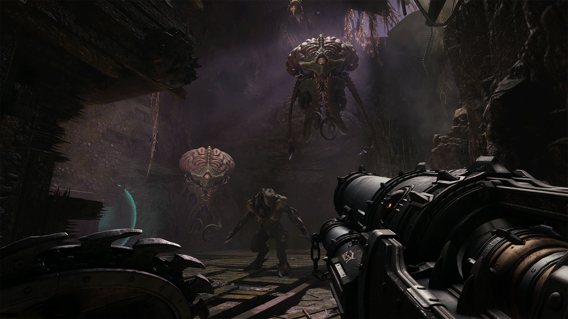 Two Cacodemons loom menacingly above the Slayer as a third demons lurks in the shadows behind them.