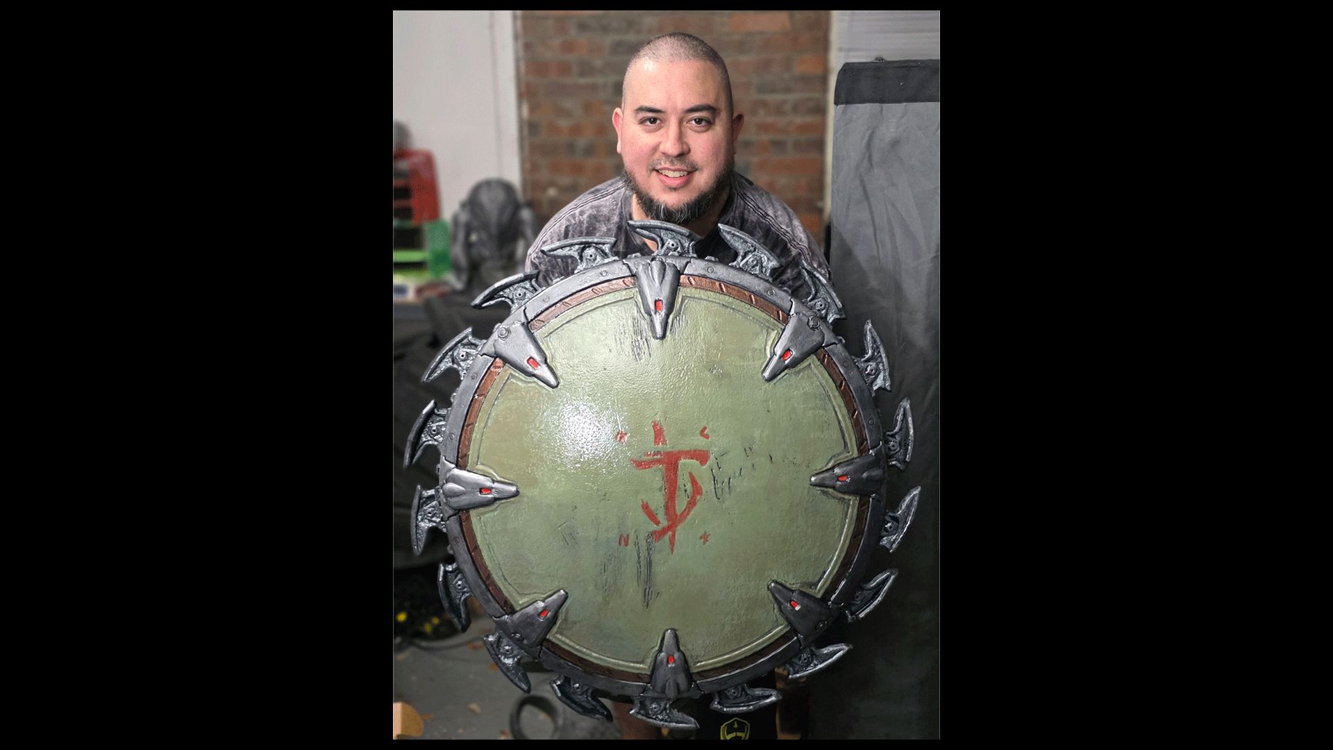 Artist GameQraft proudly wielding the Shield Saw
