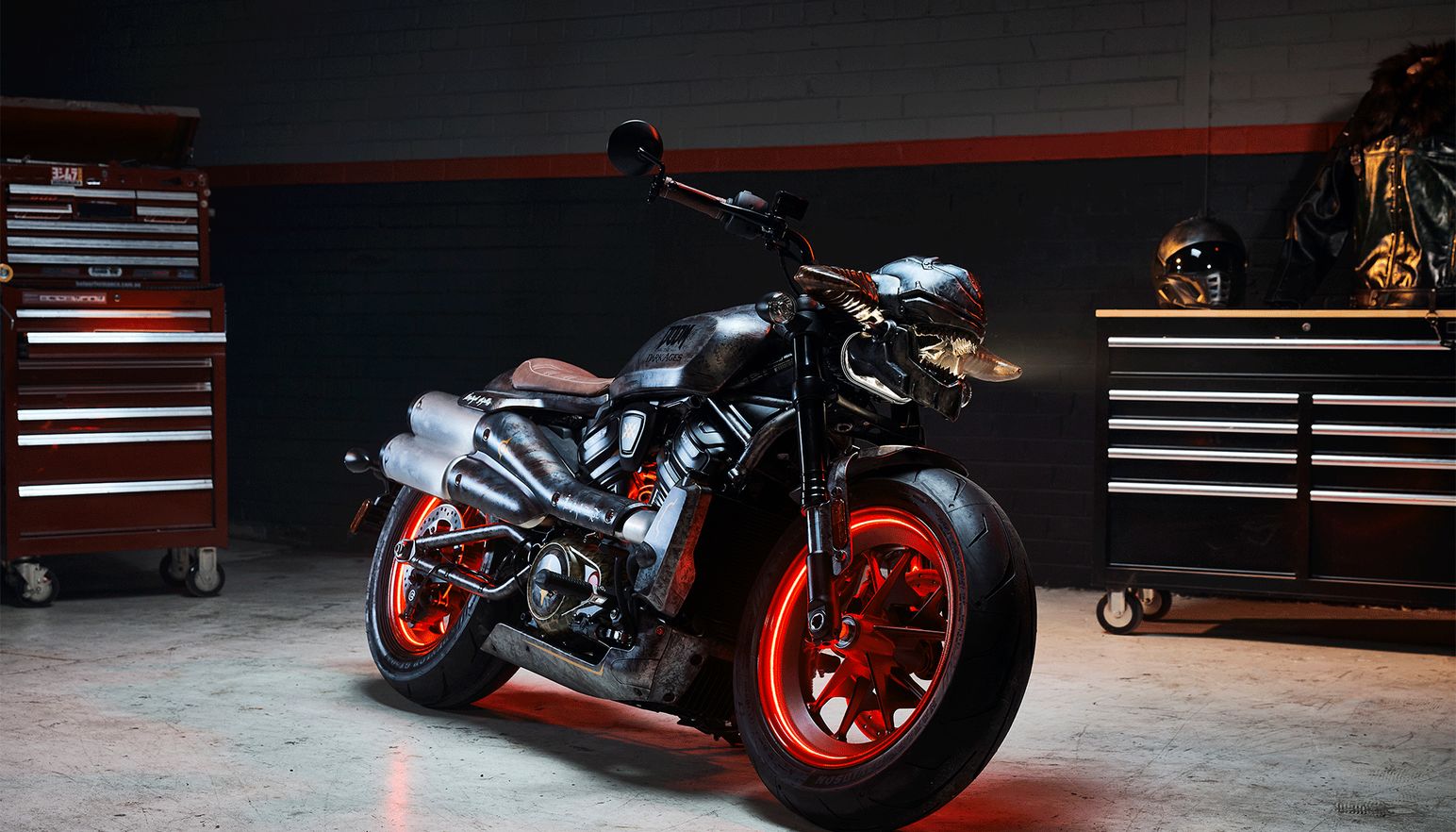 A custom Harley-Davidson motorcycle designed after the Slayer's Mecha Dragon with red lighted detailing and more.