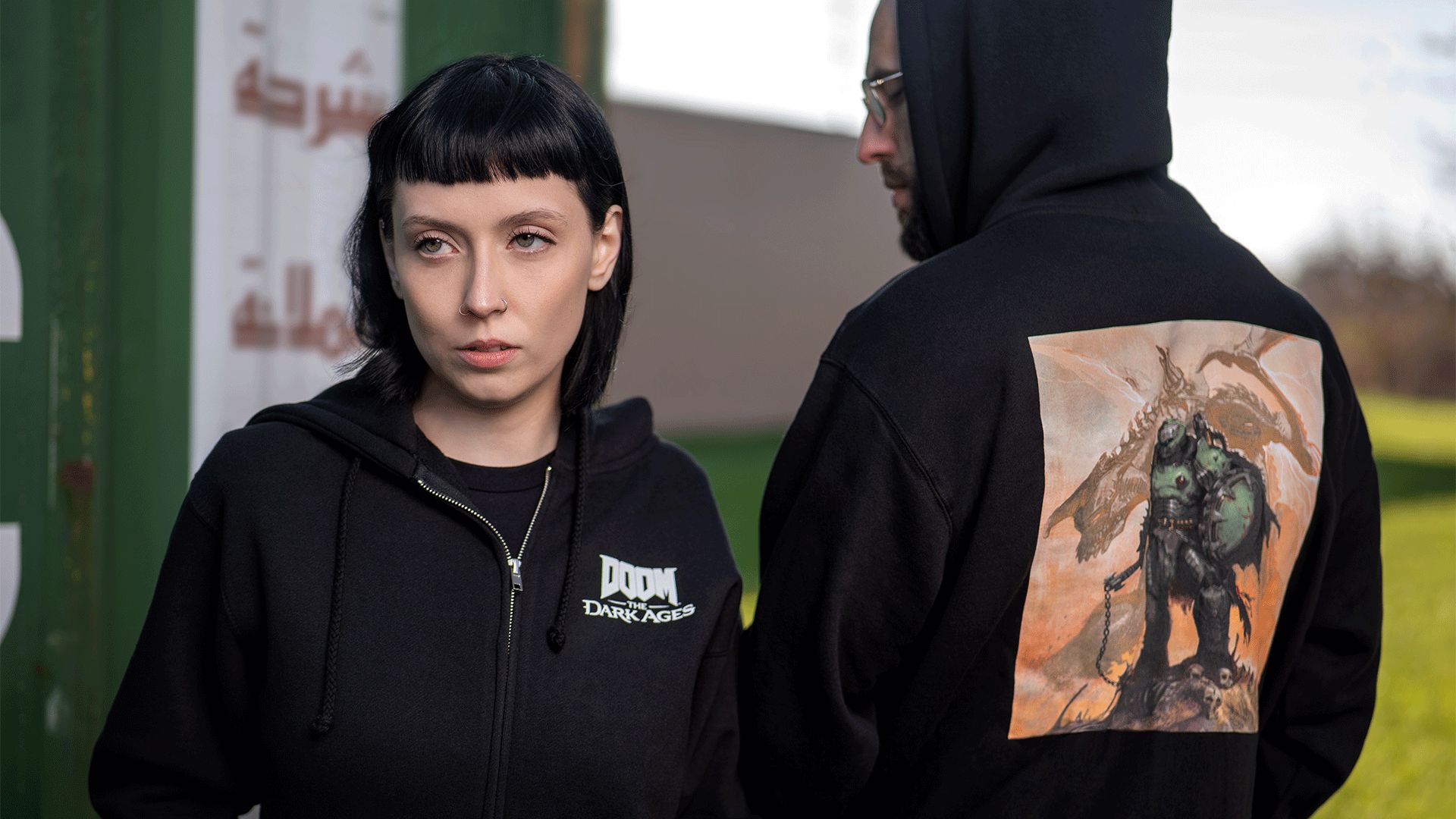 Artwork of the Slayer on the back with the DOOM: The Dark Ages on the front on a black full-zip hoodie.