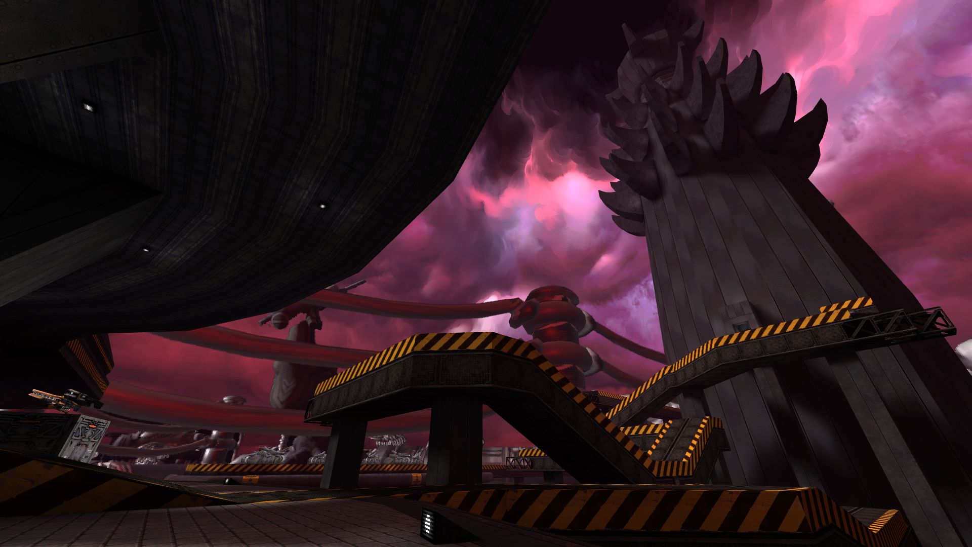 A dark pink cloudy sky looming overhead.